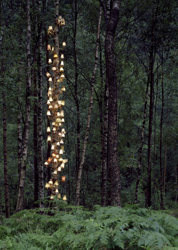 the-iridescence:  Norwegian conceptual artist Rune Guneriussen explores a fascinating balance of human culture and nature with his outdoor installations of electric lamps, stacked books, chairs, and phones that appear to have gathered in small herds