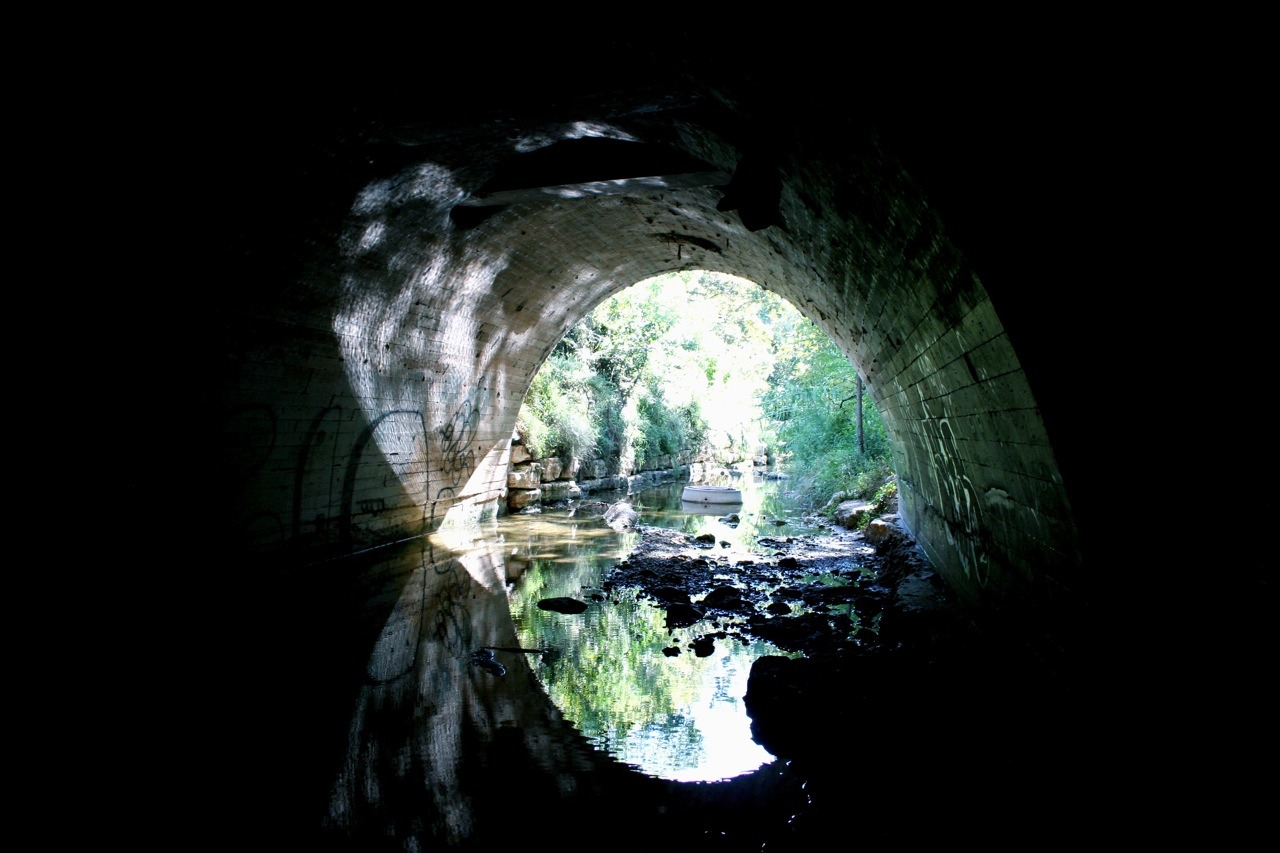 I decided to see what was under a bridge in town, while on a walk.
I found a bunch of clothes and graffiti mostly.