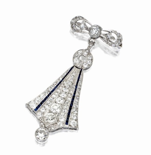 Platinum, diamond and sapphire pendant brooch, circa 1920.