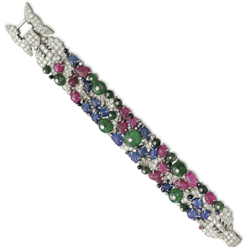 Cartier Tutti-Frutti bracelet. The carved ruby and sapphire leaves, enhanced by emerald and onyx bea