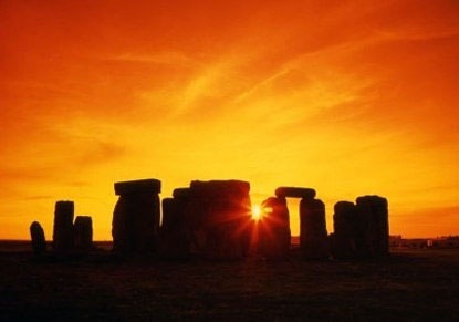 gentledom:  I may be mistaken but I think this is Stonehenge at dusk. My preferred time to see it is at dawn when almost nobody is there and the sun creates this special ambiance where you forget it is usually a crowded place and there is this huge fence