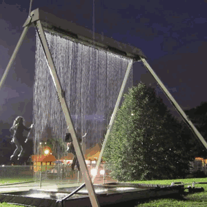 livetomakeadifference:   Towering steel swing set holding arrays of mechanical solenoids