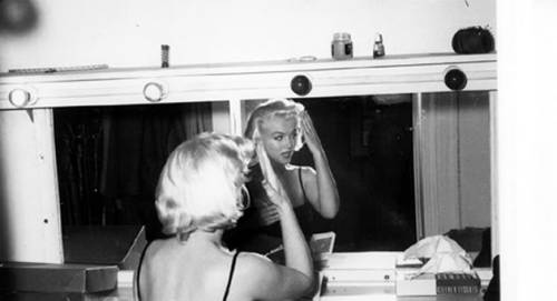 thatgirlupstairs:Rare photo of Marilyn at her vanity, photo by Milton Greene.