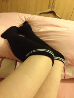 nuttypop:  Today’s long socks. Black with silver tops. 