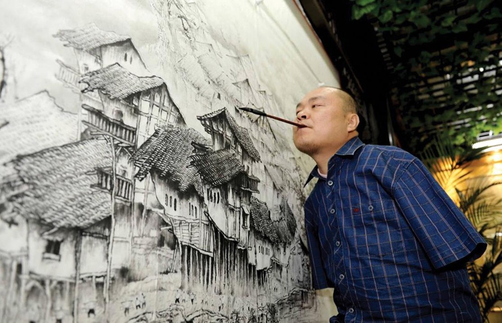likeafieldmouse:  Huang Guofu  The artist lost both his arms at the age of four