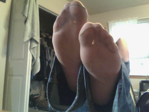 cheapathalfprice:cheapathalfpricereblogs: My feet in sheer stockings. You know you want to rub my 