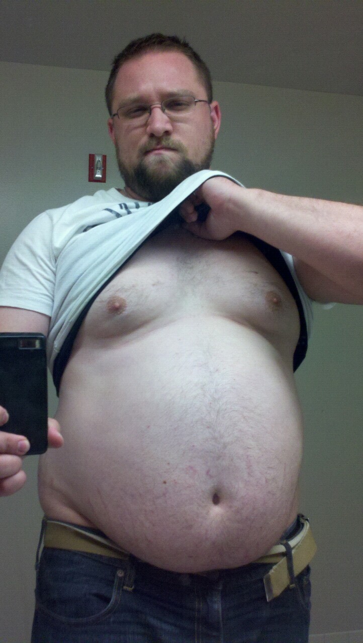electricunderwear:  thanatos85:  Tummy Tuesday: Scowling Nerd in Glasses Edition.