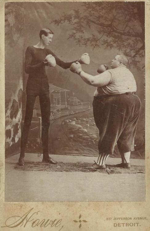 infinite-paradox:  just-collecting-dust: Boxers: George Moore: age 21, weight 110, height 7’2”   Fred Howe: age 21, weight 435, height 5’4”  Courtesy of the Victorian Images Group on Facebook