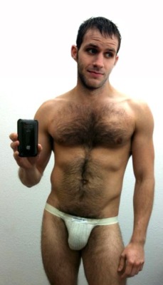 itsonlypubes:  Very cute furry cub with iphone. 