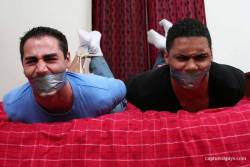 gaggedramdog:  Hogtied and tape gagged From CAPTUREDGUYS.COM 