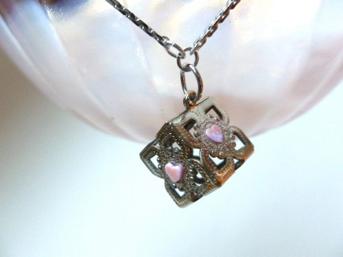 Look at this adorable Companion Cube necklace! Sold out on Etsy, but hopefully there will be more so
