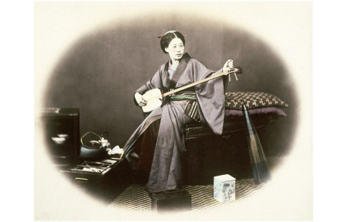 “Girl Playing the Samisen”, by by Felice Beato , about 1880