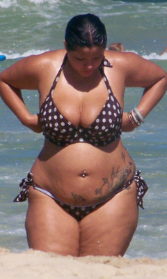 mrbootyluver:  curvesincolor:  I LOVE HER BODY.   I don’t as she’s a fat bitch in the wrong swimwear  I think SHE IS Sexy. FUCK YOU!