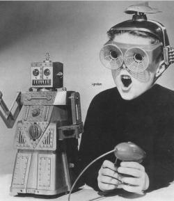  Boy with toy robot, 1950 s 