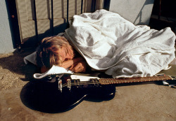 can-you-feel-my-farts:   Kurt Cobain asleep after the underwater shoot of Nirvana for Nevermind. Kurt didn’t feel well that day.  rest in peace buddy, can’t believe it’s been twenty years today. 