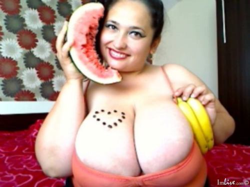 Big Tit Latina eats watermelon and shakes her gigantic boobs live on cam