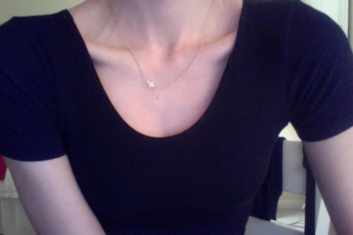 au-urora:  cross around da neck 