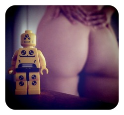 willrotic:  aglimpseofher:  {c’mon, admit it ….you were staring at the lego man !}  Lego dude is going to be sooo upset when he finds out what he missed! 