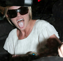sexystars:  Britney Spears sticks out her tongue and shows off what she just did with her then boyfriend Adnan