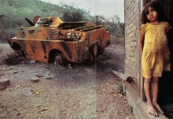 nationalgeographicscans:  “Endless war and upheaval have stolen Christina Blandon’s childhood.  Next to her home in northern Nicaragua lies a Soviet-built reconnaissance vehicle disabled by rebels.” (December 1985) 