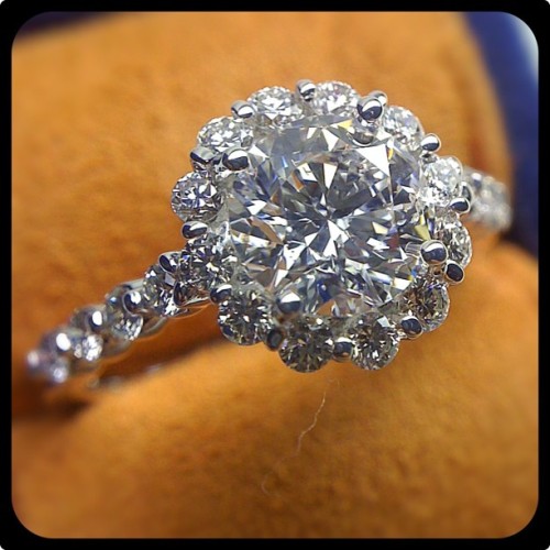 This brilliant 1.50 carat round diamond in the custom Insignia-7033 will brighten any day.