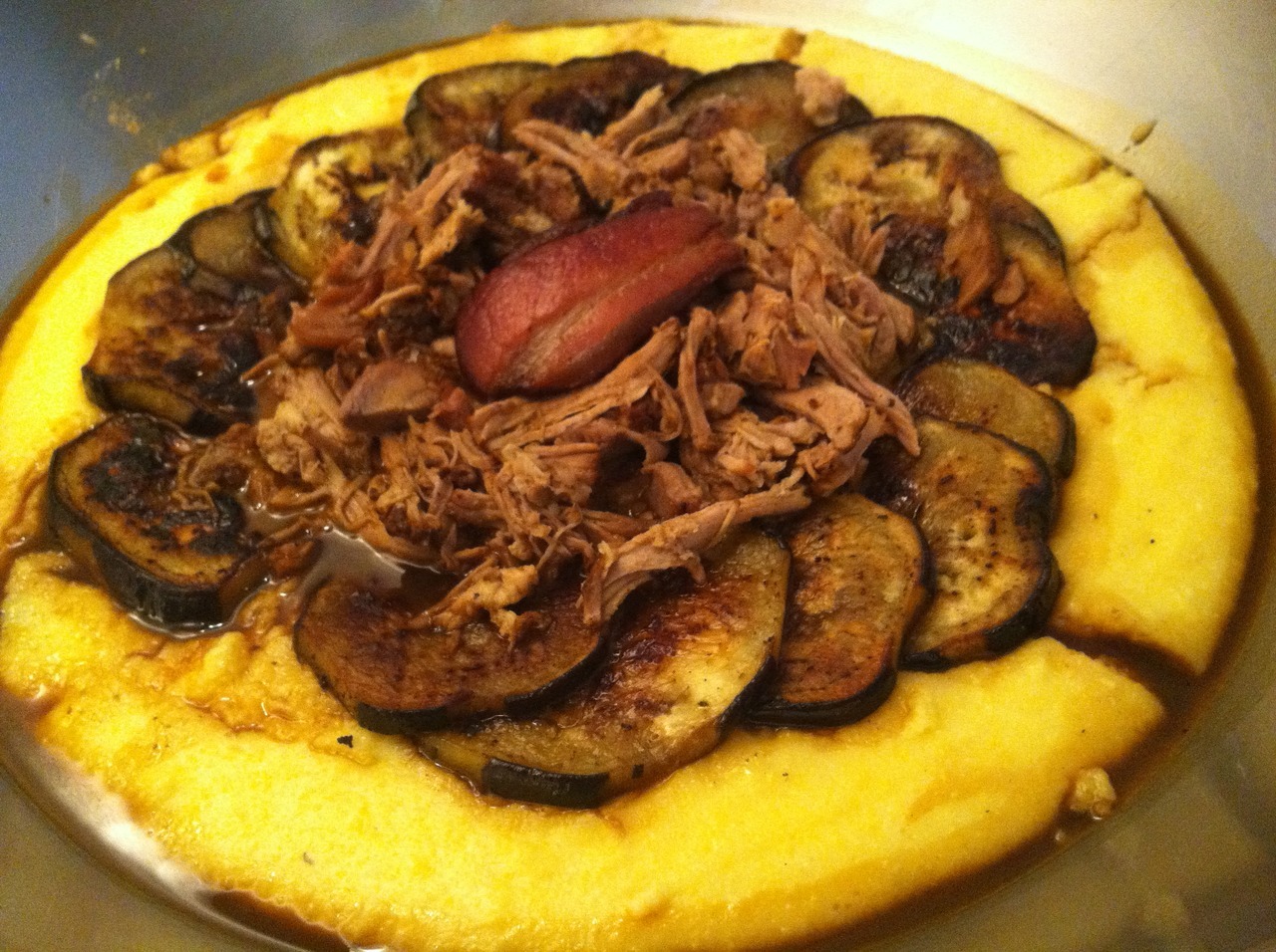 Creamy polenta paired with tender braised pork