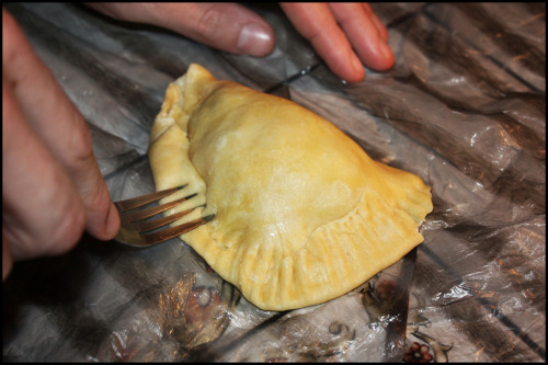 BEEF EMPANADASAdapted from Gourmet and Smitten KitchenEver since we were offered a steaming plate of