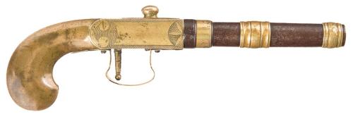 Brass frame Asian Single Shot Pistol.The barrel screws off of the pistol, the user then inserts a .3