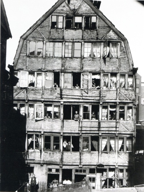 booksvscigarettes: House and people living in it in Hamburg, Germany c1904Photograph by Hans Breuer