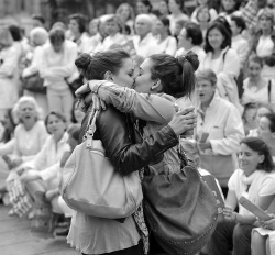 god-forgiveme:  These two girls have kissed in front of a homophobic demonstration against the right for homosexuals to adopt children. They’re my hero.  
