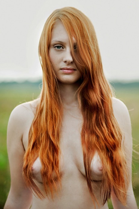 Sexy redhead with long red hair topless outside. adult photos