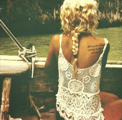 Have that shirt, love her tattoo!