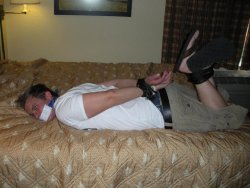 bookofbaitnate:  Spring Break left him broke when the room serviceman tackled him, tied him up, and jacked his wallet. 
