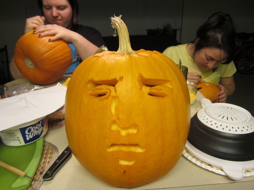 starlightexcellent:  My roommates and I carved pumpkins. I made this one.  Here it is with a candle.  Happy Halloween. 