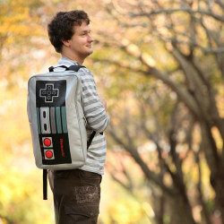 copiouslygeeky:  NES Controller Backpack Available at ThinkGeek Warning: May induce fits of nostalgia.