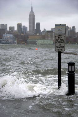 bayronortiz:  hiphoplaboratory:  The Hudson River swells and rises over the banks of the Hoboken, N.J., waterfront as Hurricane Sandy approaches on Monday, Oct. 29, 2012. Hurricane Sandy continued on its path Monday, forcing the shutdown of mass transit,