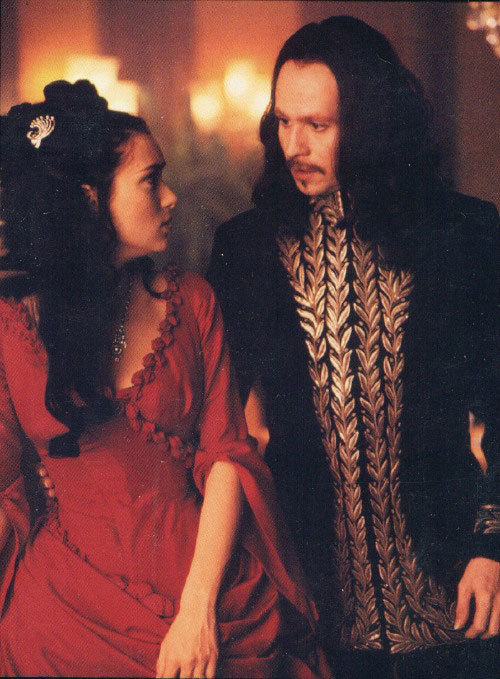 Dracula, 1992Costume design: Eiko Ishioka red gown with diagonal ruffles, gathered petal shaped spli