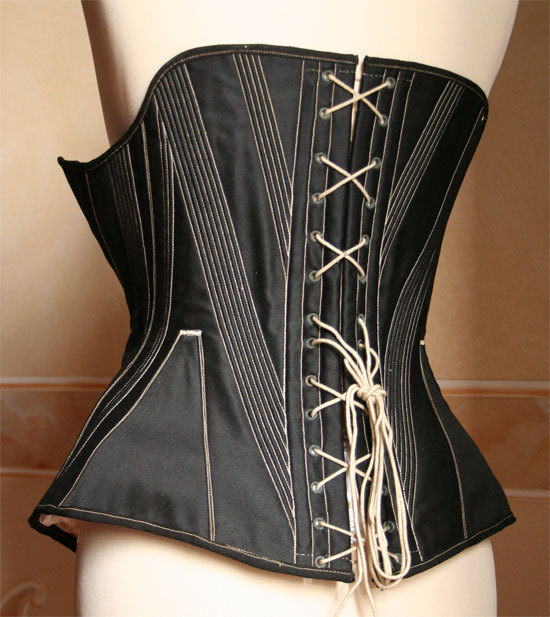 historicalcorsets:  Black satin corset c. 1865 (via Abiti Antichi). 