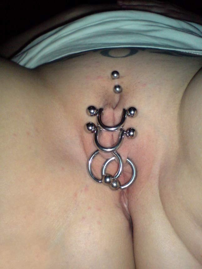 Extreme piercing pussy tattoos