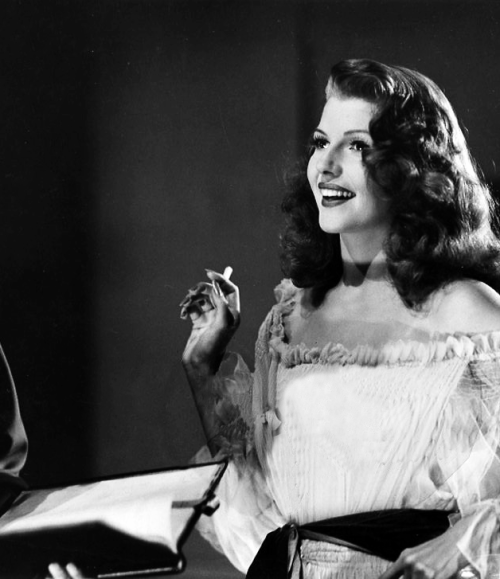   Rita Hayworth behind the scenes of Gilda, c. 1946.  