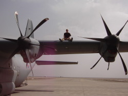 r1vet:  On the wing of a Hercules C-130 out in Kandahar, Afghanistan. Because it was real busy that day.. 