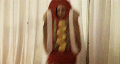  Lady Gaga dancing in a hot dog custume. 