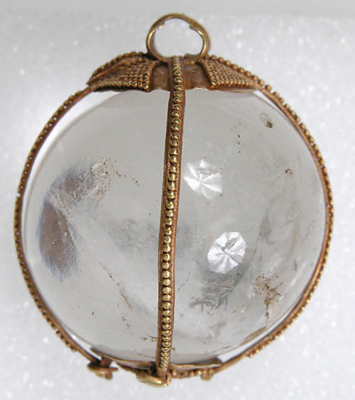 ancientpeoples: Rock crystal spherical pendant, with a gold fitting.  Hunnic or Frankish, ca. 4