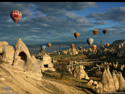 Hot air balloons rise over Capadoccia, Turkey