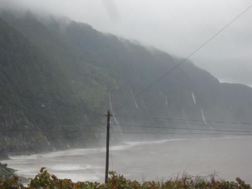 drrone:  masturb88:  This is my village. Whenever it rains, mysterious waterfalls appear and destroy everything. Porto Moniz, Madeira Island.  this is so pretty 