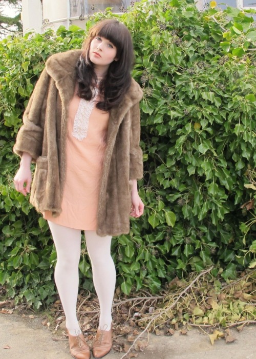 Opaque white tights, salmon dress and furry coat