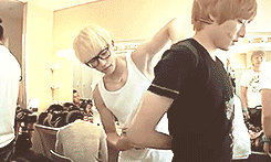 Kiseop helping Kevin get ready before they