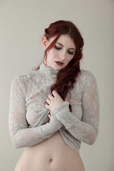 Porn Pics Gorgeous redhead in a lacy, see-through top.