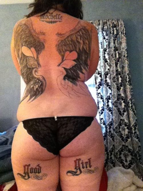roguecowgirl:  roguecowgirl:  My backside tattoos, my middle name, custom wings,