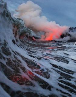 I never thought japanese style tattoo water looked real til I saw this movement-and-yoga:  Lava entering ocean, Big Island, Hawaii 